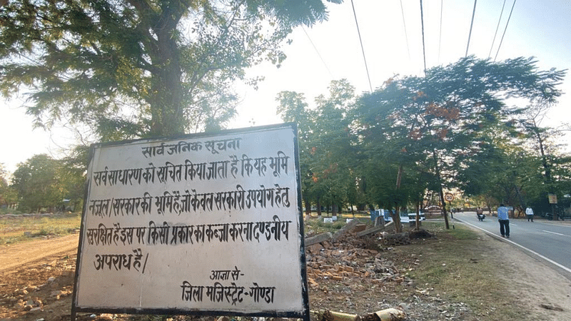 At the spot where bulldozer rolled out on 3 February, a board now hangs mentioning that taking possession of land is a punishable offence | Shikha Salaria | ThePrint
