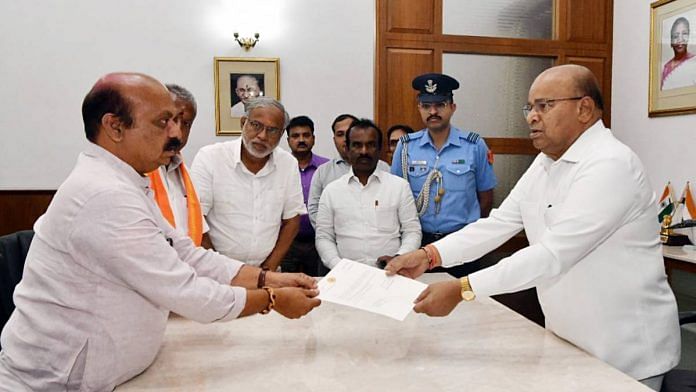 Basavaraj Bommai tenders his resignation to state Governor Thawar Chand Gehlot following BJP's defeat in the Karnataka Assembly Election | Photo: ANI