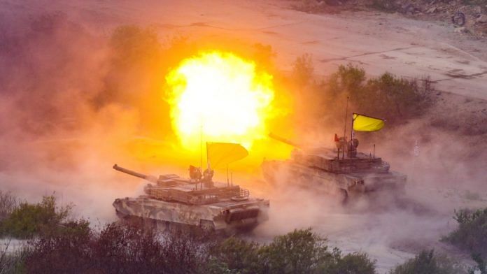 The South Korean army's K-2 tanks fire during South Korea-U.S. joint military drills at Seungjin Fire Training Field in Pocheon, on 25 May 2023 | South Korean Defence Ministry/Yonhap via Reuters