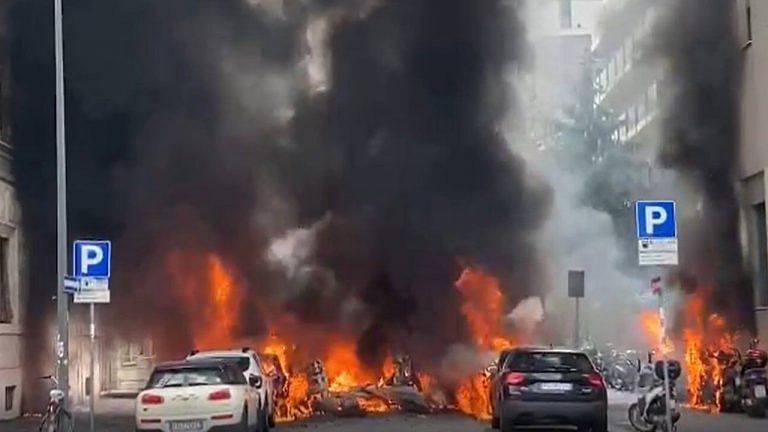 Several vehicles catch fire after explosion in Milan, 1 injured
