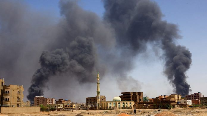 Smoke rises above buildings after aerial bombardment, during clashes between the paramilitary Rapid Support Forces and the army in Khartoum North, Sudan, on 1 May 2023 | Reuters