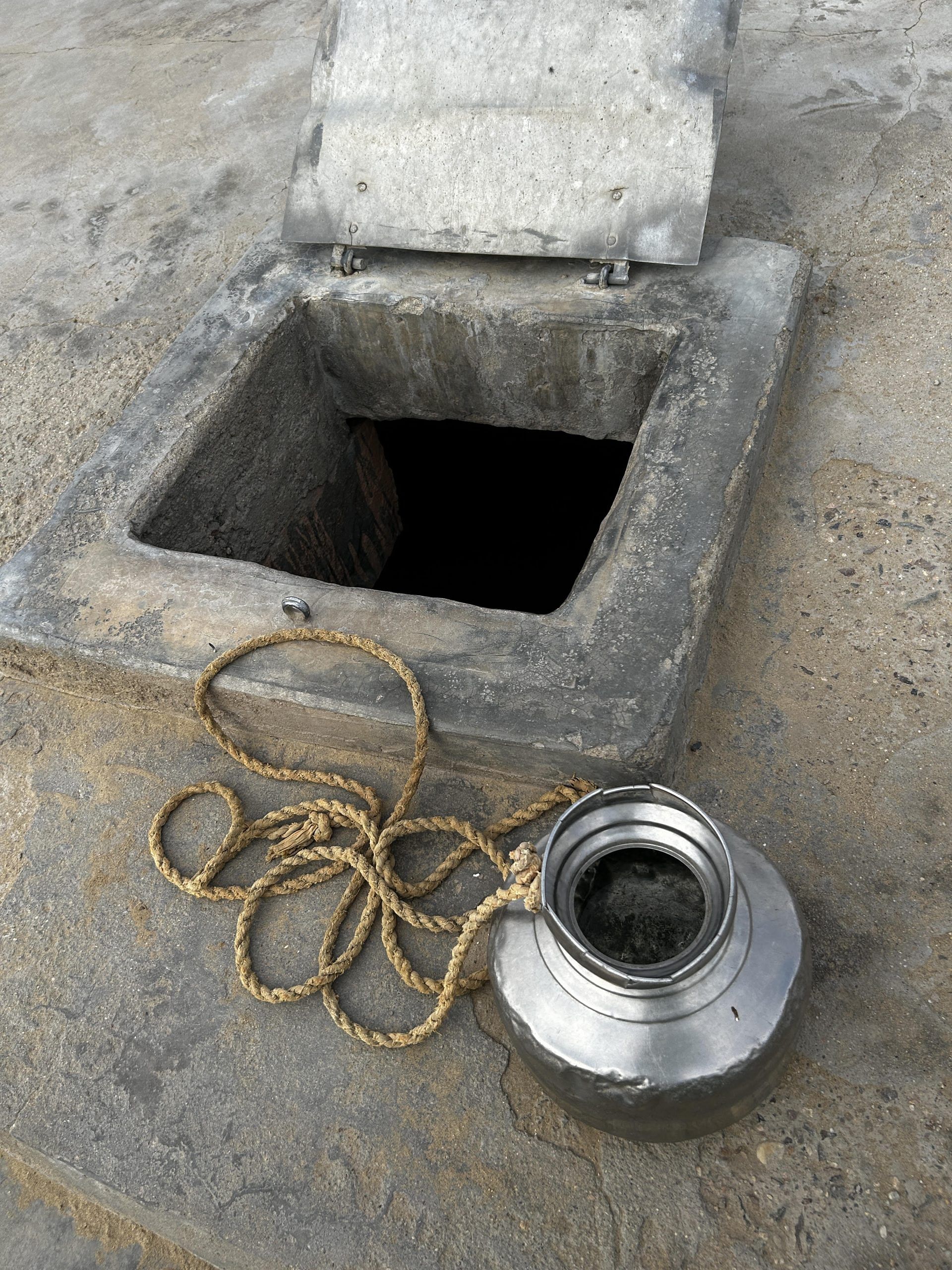 Most wells are now sealed with concrete, except for a small opening that allows families to fetch water. | Jyoti Yadav | ThePrint