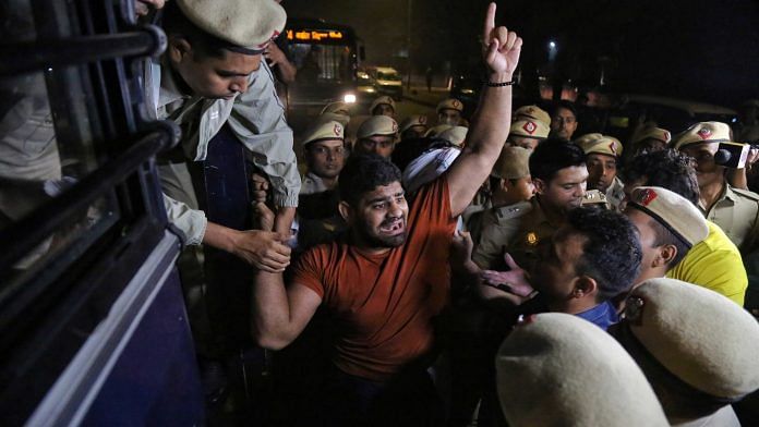 Scuffle between wrestlers and cops at Jantar Mantar in New Delhi in the early hours of Thursday | ThePrint/Suraj Singh Bisht