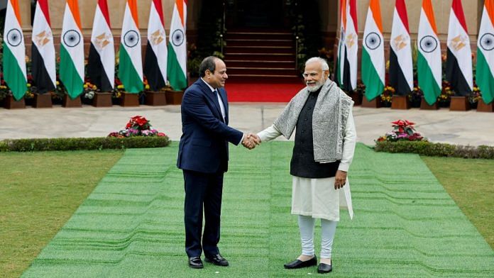 Egyptian President Abdel Fattah El Sisi shakes hands with Indian Prime Minister Narendra Modi before their meeting at the Hyderabad House in New Delhi | Reuters