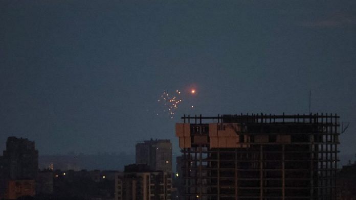 An explosion of a drone is seen in the sky over the city during a Russian drone strike, amid Russia's attack on Ukraine, in Kyiv | Reuters