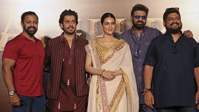 Actors Prabhas, Sunny Singh, and Kriti Sanon, with director Om Raut, pose for photos during the trailer launch of their mythological film ‘Adipurush’, in Mumbai | ANI