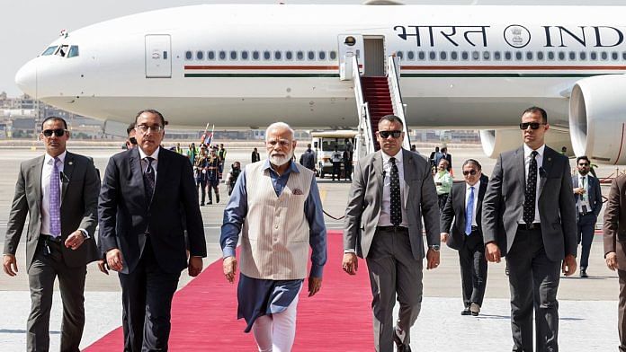 Prime Minister Narendra Modi being received by Egyptian PM Mostafa Madbouly on his arrival in Cairo, Egypt on Saturday | ANI