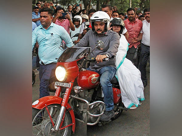 West Bengal CM rides pillion on bike in Kolkata during march in wrestlers' support