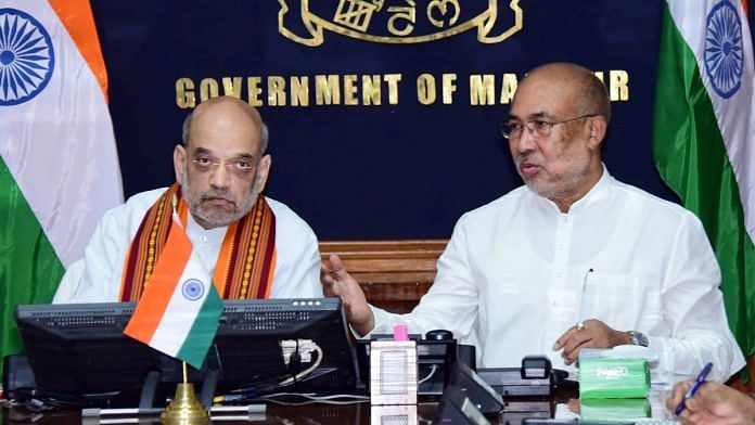 Union Home Minister Amit Shah chairs a meeting with Manipur Chief Minister N Biren Singh and his council of Ministers in Imphal on 30 May 2023 | ANI