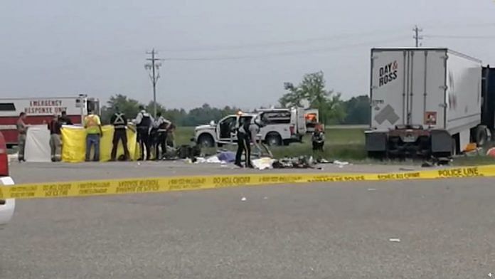Police secures the area at the crash scene near Carberry, Manitoba, Canada June 15, 2023 in this still image obtained from a social media video | via Reuters