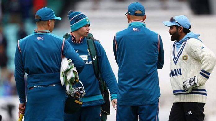 Indian cricketer Ravindra Jadeja chats with Australian cricketers | Reuters