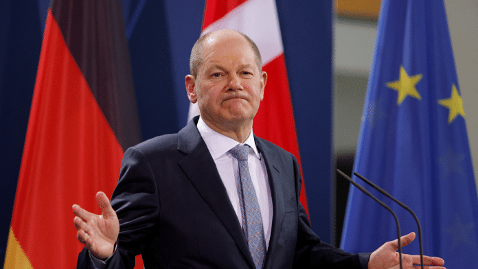 German Chancellor Olaf Scholz speaks to the media during a joint news conference with Danish Prime Minister Mette Frederiksen following talks at the Chancellery, in Berlin, Germany, February 9, 2022. Michele Tantussi/Pool via REUTERS