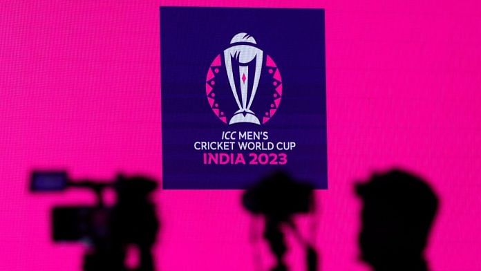 Cameras are seen in front of the logo of the upcoming ICC Men's Cricket World Cup before a press conference in Mumbai, on June 27, 2023 | Reuters/Francis Mascarenhas