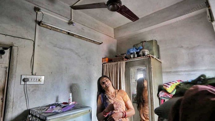 Parvaben standing in the room where her husband, Pravin, died by suicide | Praveen Jain/ThePrint