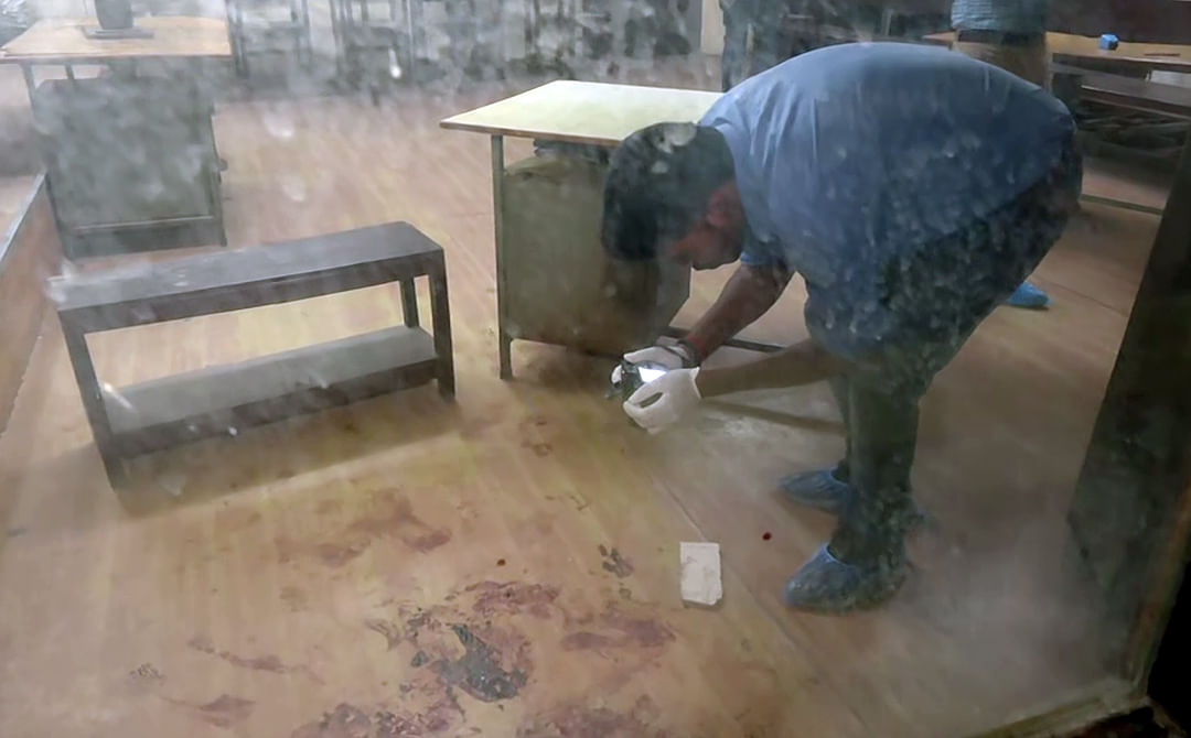 A forensic team investigates the crime scene at the Lucknow Civil Court, where gangster Sanjeev Jeeva was shot dead | ANI