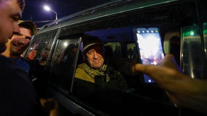 Wagner mercenary chief Yevgeny Prigozhin leaves the headquarters of the Southern Military District amid the group's pullout from the city of Rostov-on-Don, Russia, June 24, 2023/Reuters