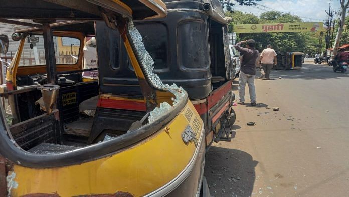 An autorickshaw damaged during a protest by members of Hindutva organisations demanding strict action against two people who allegedly posted an objectionable status on social media, at Chhatrapati Shivaji Chowk, in Kolhapur Wednesday | ANI
