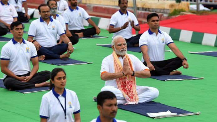 PM Narendra Modi performing yoga on the occasion of 8th International Day of Yoga at Mysore Palace grounds | ANI file photo