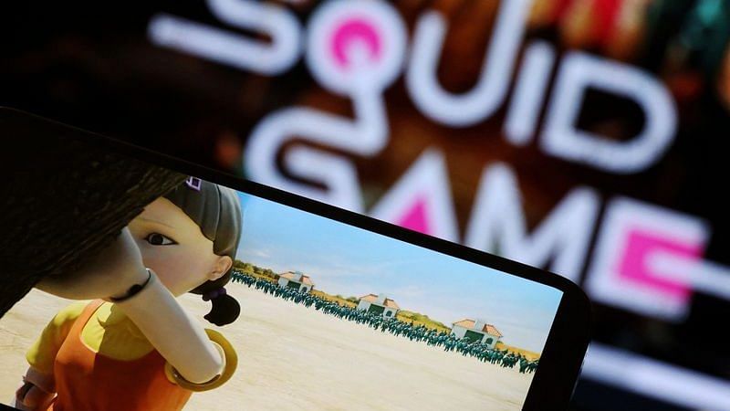 The Netflix series "Squid Game" is played on a mobile phone in this picture illustration/Reuters