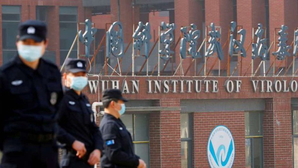 Security personnel keep watch outside the Wuhan Institute of Virology during the visit by the World Health Organization (WHO) team tasked with investigating the origins of the coronavirus disease (COVID-19), in Wuhan, Hubei province, China | Reuters/Thomas Peter/File Photo