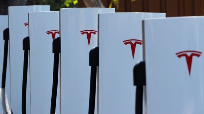 Newly installed car chargers at a Tesla Super Charging station are shown in Carlsbad, California/File Photo: Reuters
