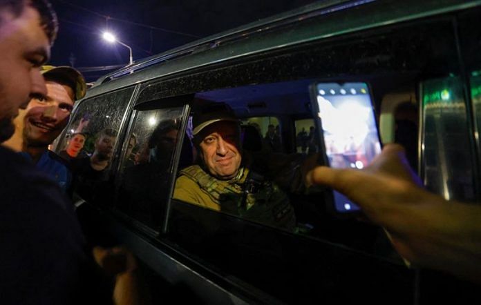 Wagner mercenary chief Yevgeny Prigozhin leaves the headquarters of the Southern Military District amid the group's pullout from the city of Rostov-on-Don, Russia, on 24 June 2023 | Reuters
