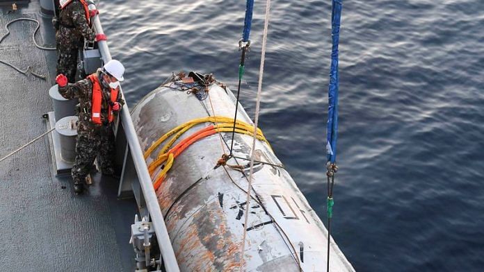 A handout picture shows a part of what is believed to be a space launch vehicle that North Korea said crashed into the sea off the west coast of the divided peninsula, and which the South Korean military had salvaged, at an unidentified location in South Korea, on 15 June, 2023 | Reuters
