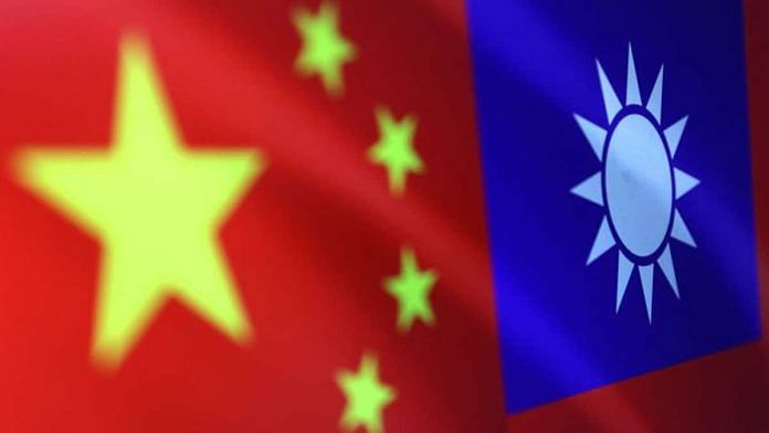 Chinese and Taiwanese flags are seen in this illustration/Image via Reuters