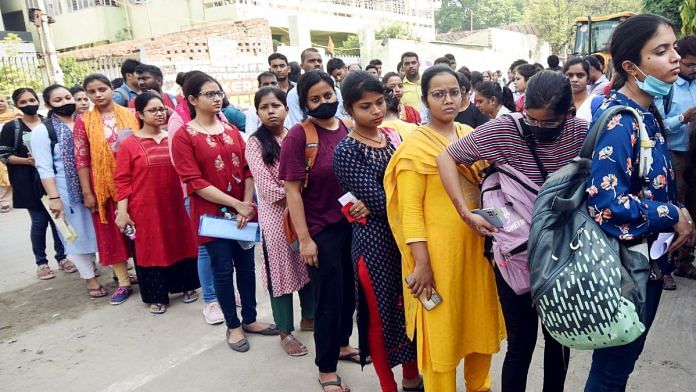Aspirants in Patna wait in a queue outside an examination center to appear for the UPSC Civil Services (Preliminary) exams | Photo: ANI