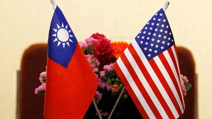 Flags of Taiwan and U.S. are placed for a meeting | Reuters/Tyrone Siu/File Photo