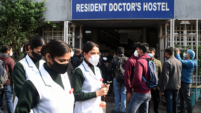 File photo of health workers outside Resident Doctors' Hostel during a protest against the delay in NEET-PG counselling in New Delhi | ANI