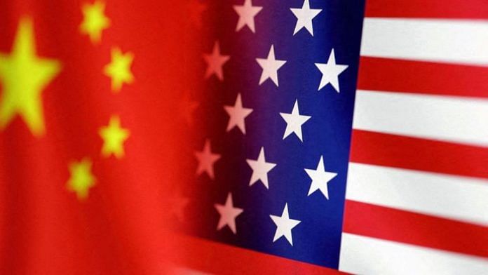 US and Chinese flags are seen in this illustration | Reuters