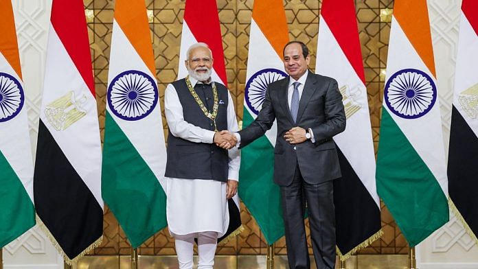 Prime Minister Narendra Modi being conferred with the highest state honour of Egypt', the Order of the Nile’ award, by Egyptian President Abdel Fattah El-Sisi, at President House, in Cairo | ANI Photo