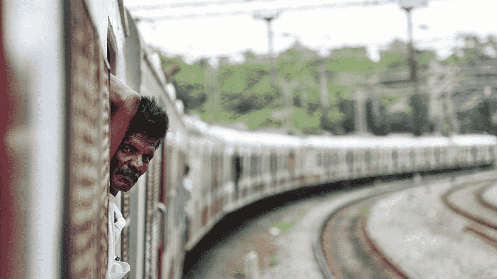 File photo of a commuter in a local train in Chennai | ANI