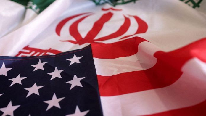 USA and Iranian flags are seen in this illustration taken, September 8, 2022. Reuters/Dado Ruvic/Illustration/File Photo