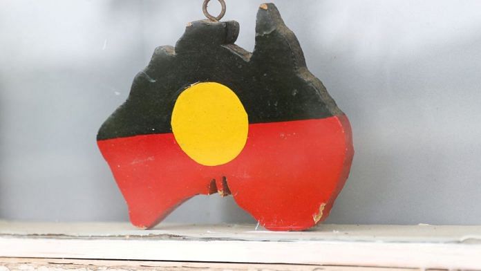 A depiction of the Australian Aboriginal Flag is seen on a window sill at the home of indigenous Muruwari elder Rita Wright, a member of the 