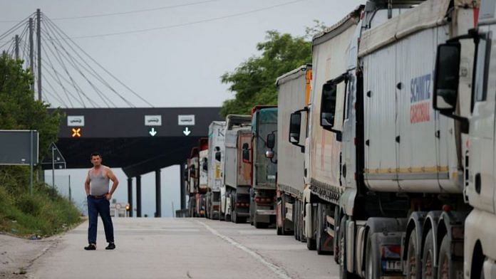 Trucks with goods queue at the Kosovo-Serbia border crossing in Merdare, Kosovo, June 15, 2023. REUTERS/Valdrin Xhemaj