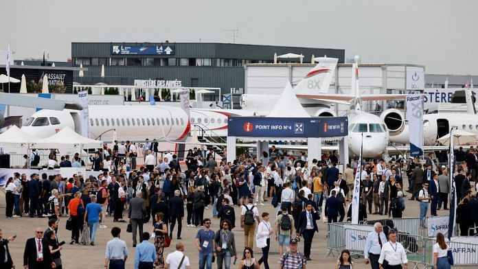 Visitors attend the International Paris Air Show at the Paris-Le Bourget Airport, France | Ludovic Marin/Pool via Reuters/File Photo