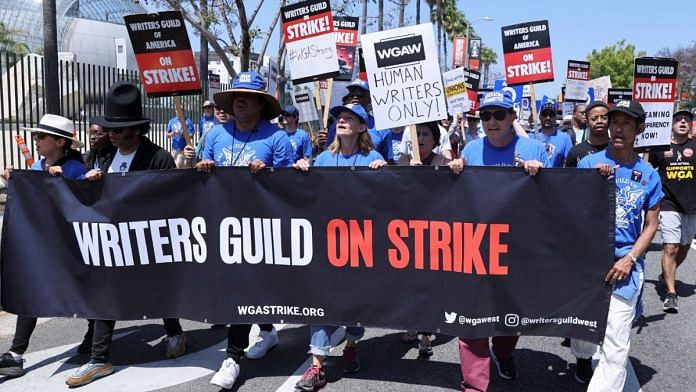 People attend a demonstration held by the Writers Guild of America as the film and TV writers' strike continues in Los Angeles | Reuters/Mike Blake