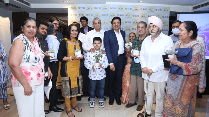 Those who underwent transplants being gifted a plant in the presence of MGM Healthcare team | Image via special arrangement