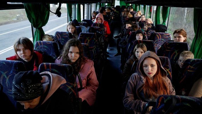 Children who went to a Russian-organised summer camp from non-government controlled territories and were then taken to Russia, wait for departure to Kyiv after returning via the Ukraine-Belarus border, in Volyn region, Ukraine | Reuters/Valentyn Ogirenko/File Photo