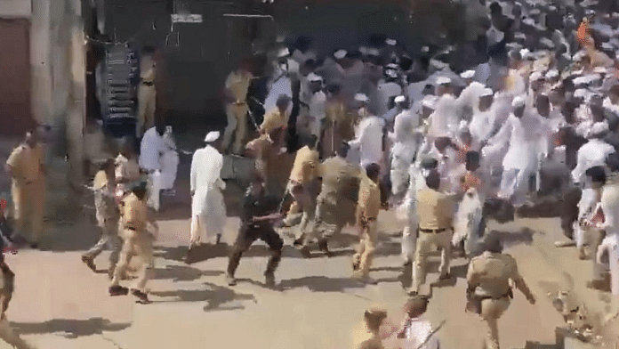 Screen grab of police chasing away Warkari devotees in Pune | Twitter | @ChhaganCBhujbal