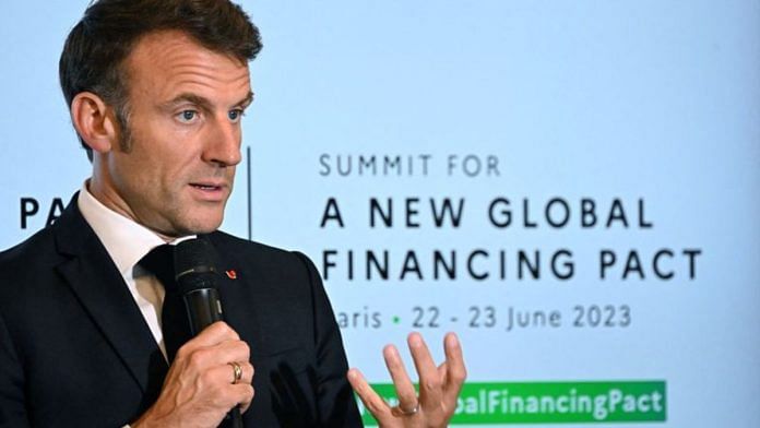 French President Emmanuel Macron speaks during the Alliance for Entrepreneurship thematic, as part of the New Global Financial Pact Summit at the Palais Brongniart in Paris, France | Emmanuel Dunand/Pool via Reuters