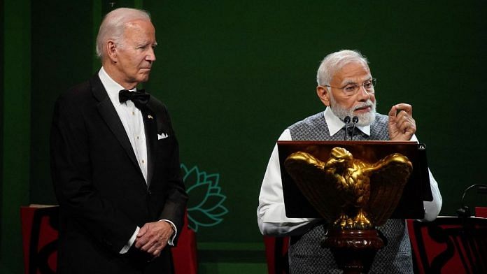India's Prime Minister Narendra Modi speaks next to U.S. President Joe Biden during an official state dinner at the White House in Washington, US | Reuters/Elizabeth Frantz