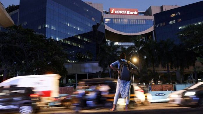 Traffic moves past the ICICI bank head office in Mumbai, India, April 21, 2023. REUTERS/Francis Mascarenhas/File Photo