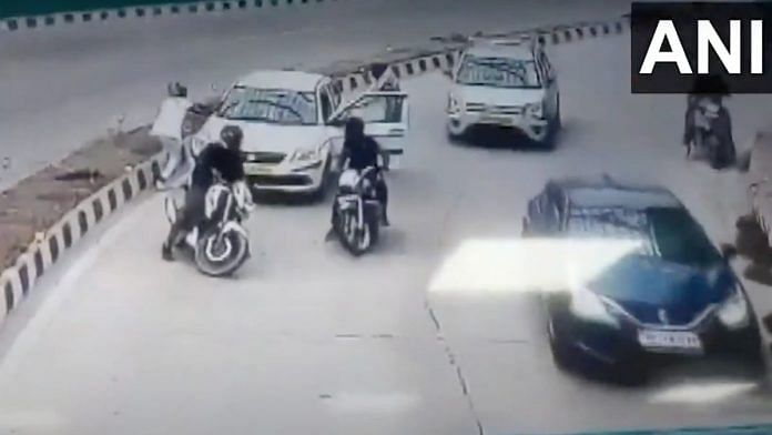 Screengrab of the CCTV footage showing the accused stop a cab near the the Pragati Maidan tunnel in New Delhi | ANI