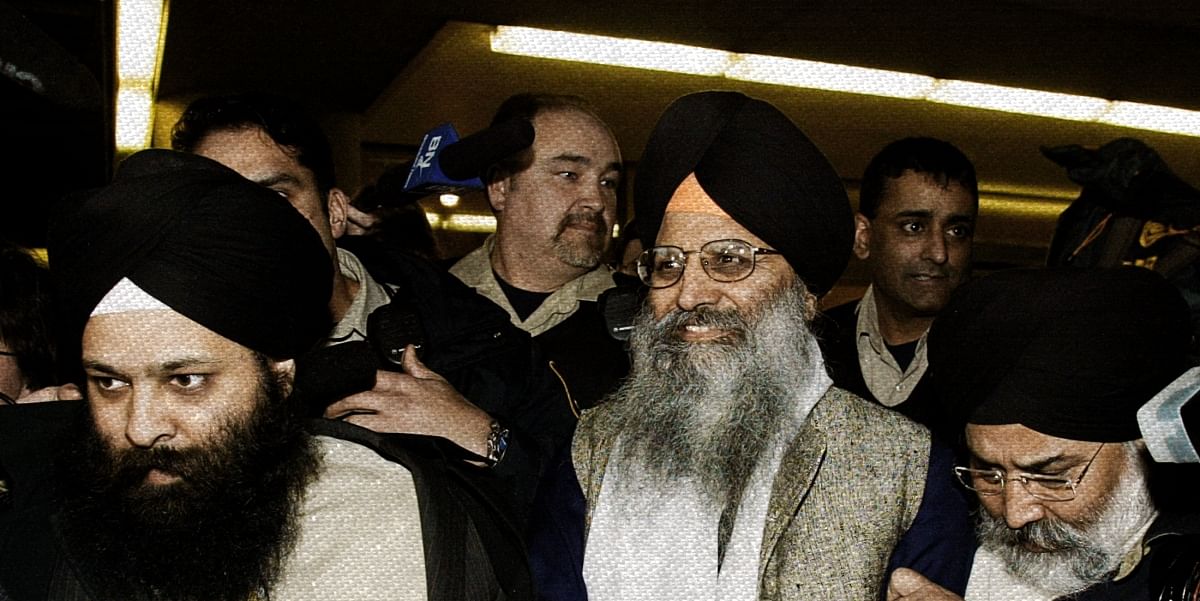 Sikh activist Ripudaman Singh Malik (C) smiles as he leaves a Vancouver court March 16, 2005, after being found not guilty in the 1985 bombing of an Air India flight off the Irish coast. Photo: Reuters/Lyle Stafford/File