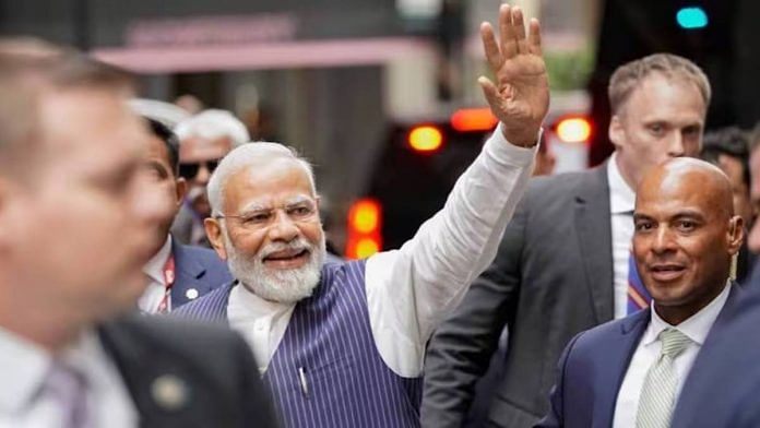 Prime Minister Narendra Modi greets supporters in New York Tuesday | Photo: AP/PTI
