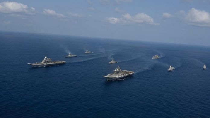 INS Vikramaditya and INS Vikrant sailing with their fleets as part of the Navy's mission to showcase its capability and power, in the Arabian Sea Saturday | By special arrangement