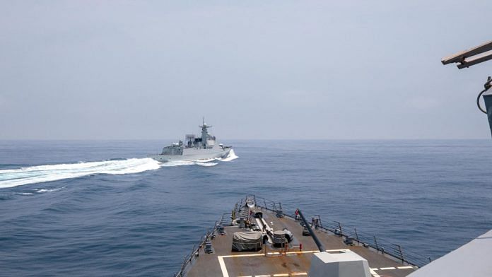 Chinese warship Luyang III sails near the U.S. destroyer USS Chung-Hoon | Reuters
